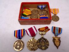 Ten American war medals on ribbons