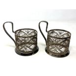 Two Russian white metal cup holders marked Hommet