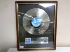 Official American RIAA Award for 'Reach the beach' by The FIXX presented to Jukes Productions to