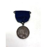 A scarce Edwardian silver medal Golden Circle for Merit June 1902