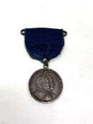 A scarce Edwardian silver medal Golden Circle for Merit June 1902