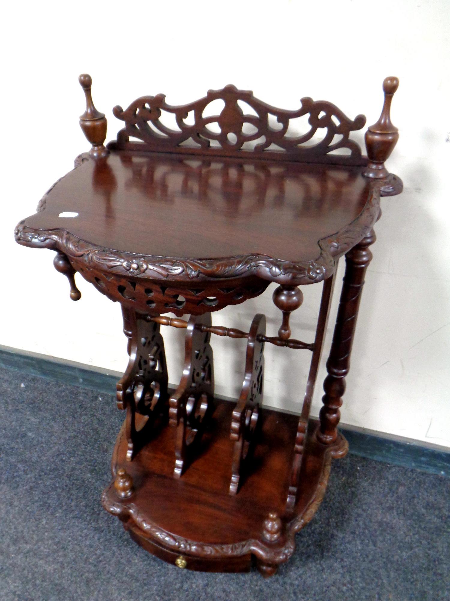 A Victorian style fretwork magazine table