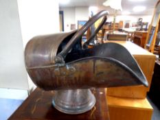 A Victorian copper coal helmet