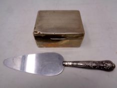 A silver and boxwood cigarette box together with a silver handled cake slice