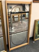 A pine framed mirror 61 cm x 117 cm