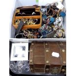 A tray containing a collection of costume and silver jewellery to include necklaces,