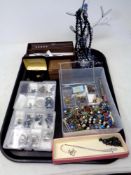 A tray of costume and silver jewellery, jewellery stand,