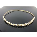 A 9ct gold and cultured pearl necklace, 10.8 g gross.