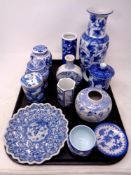 A tray of blue and white Chinese style ceramics