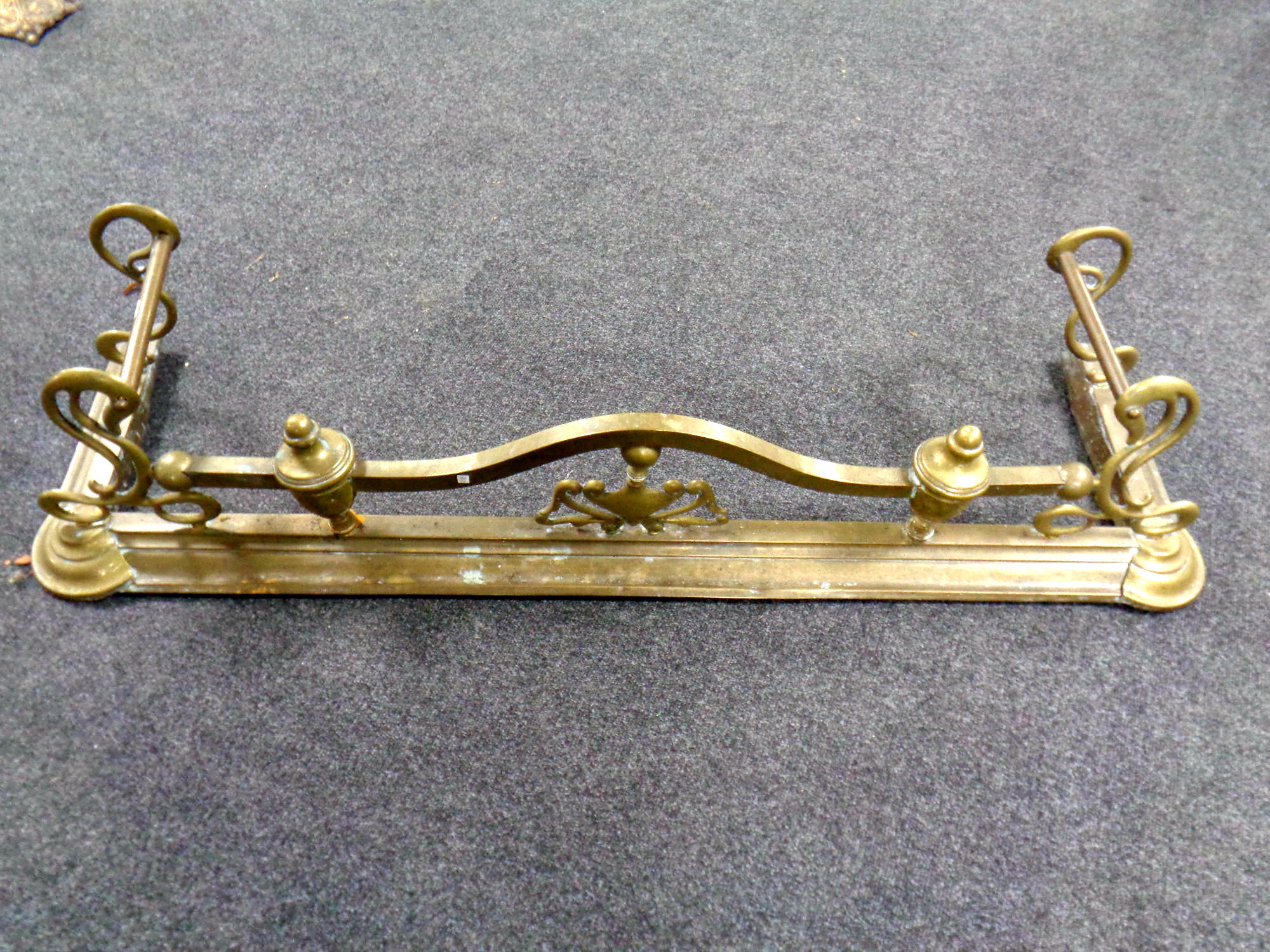 An antique brass Art Nouveau fire fender CONDITION REPORT: internal measurements :