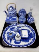 A tray of blue and white Chinese style ceramics