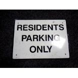 A metal Residents Parking Only sign