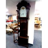 A George III mahogany eight day longcase clock with painted moon phase dial signed George Monks,