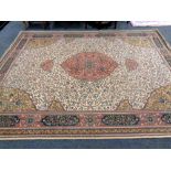 A machined carpet of Tabriz design,