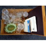 A box of glass ware, paperweights, coronation plates, canteen of Oneida flexfit cutlery,