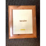 Ten Xenos wooden photo frames, 20 cm x 25 cm, all brand new and still wrapped.