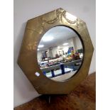 An octagonal brass framed Art Deco style mirror