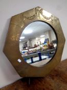 An octagonal brass framed Art Deco style mirror