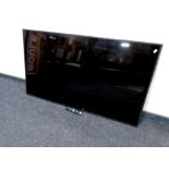 A Samsung slimline 55 inch LCD TV with remote and lead (no stand)