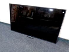 A Samsung slimline 55 inch LCD TV with remote and lead (no stand)