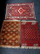 Three eastern rugs