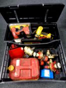 A large Stanley tool box containing Hilti and Dewalt electric drill, hand tools,