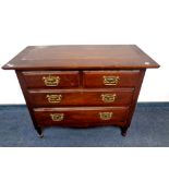 An Edwardian four drawer chest
