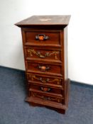 An Eastern mahogany square tapered six drawer chest with hand painted decoration