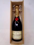 A bottle of Moet & Chandon champagne in fitted wooden box