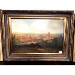 A reproduction print of a 19th century landscape in gilt frame.