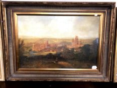 A reproduction print of a 19th century landscape in gilt frame.