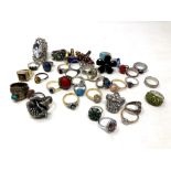 A collection of silver and cocktail rings (40)