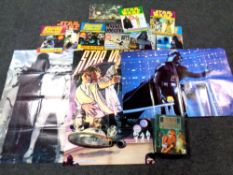 A basket of ten Star Wars and Empire Strikes Back official poster monthly, further Star Wars book,