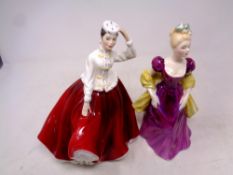 Two Royal Doulton figures;