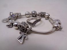 A Pandora charm bracelet together with a lady's silver ring