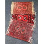 Three small Afghan rugs