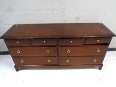 A Stag Minstrel eight drawer chest, width 156 cm.