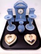 A tray of three piece Wedgwood Jasperware clock garniture together with further pair of