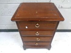 A Stag Minstrel four drawer bedside chest, width 53 cm.