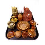 A tray of carved Buddha figure, treen pieces, brass ware, letter rack,