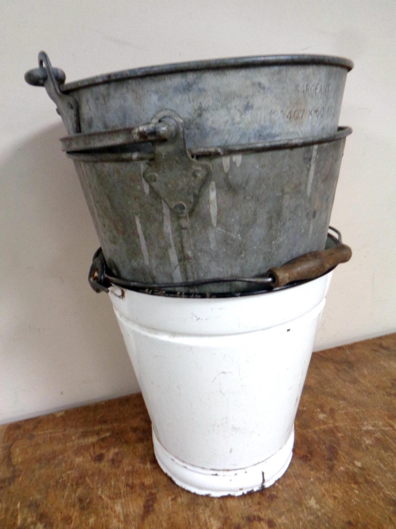 Two galvanised buckets and a further enamelled bucket