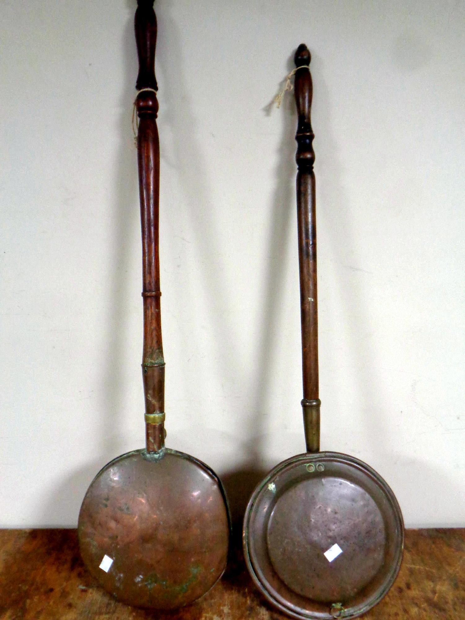 Two 19th century brass bed warming pans