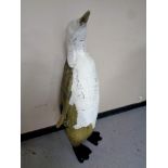 A fibre glass figure of an Emperor penguin, height 124 cm.