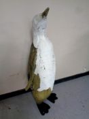 A fibre glass figure of an Emperor penguin, height 124 cm.