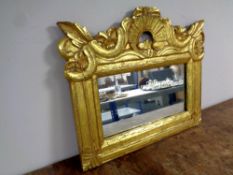 A contemporary gilt framed overmantel mirror