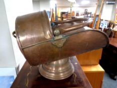 A Victorian copper coal helmet