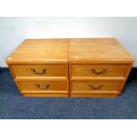 A pair of teak G-plan two drawer bedside chests, width 50 cm.