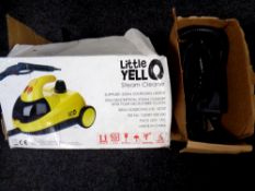 A Yello steam cleaner, boxed,