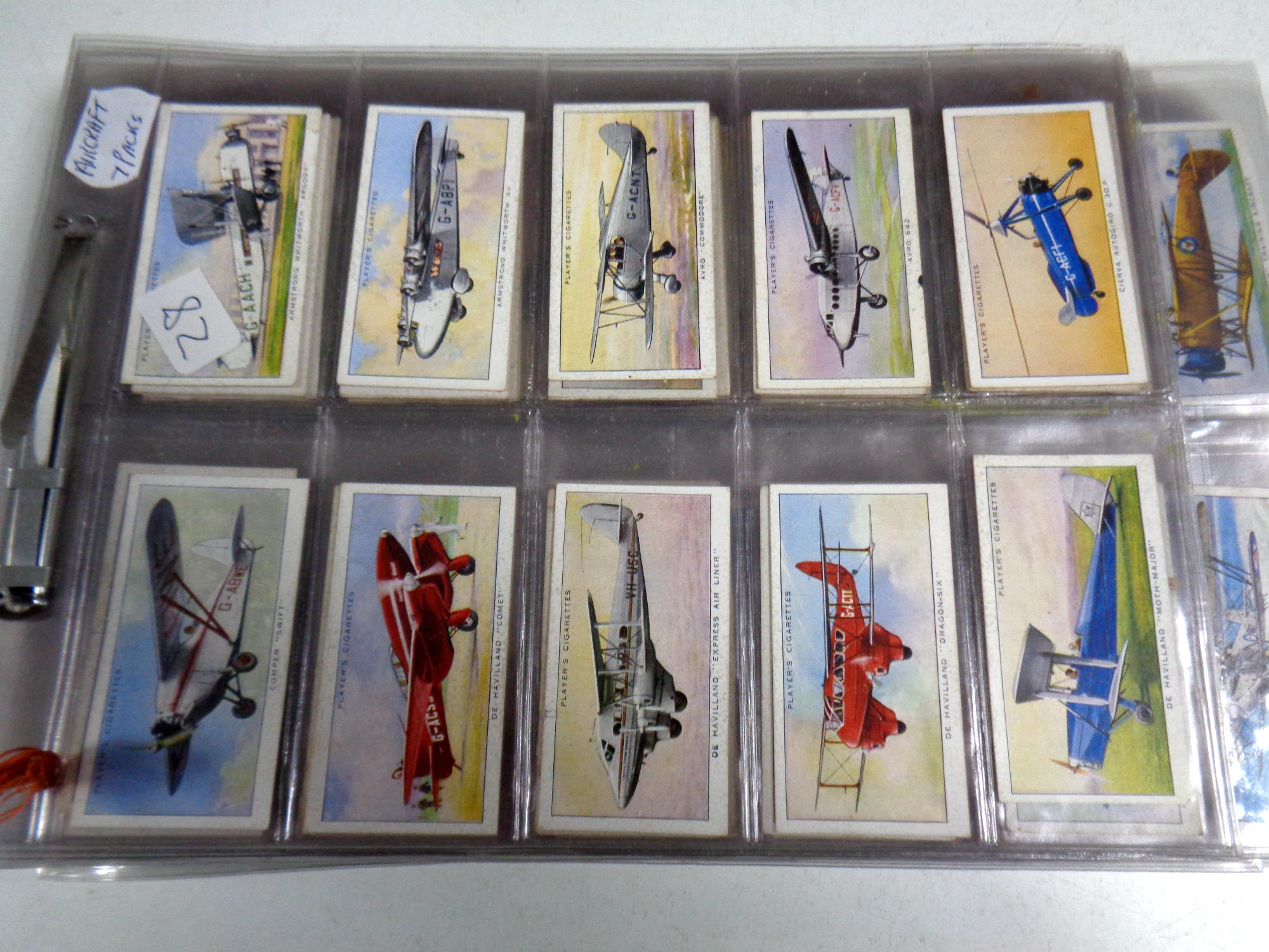 Quantity of John player and Wills cigarette cards, speed,