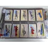 Quantity of John player and Wills cigarette cards, speed,